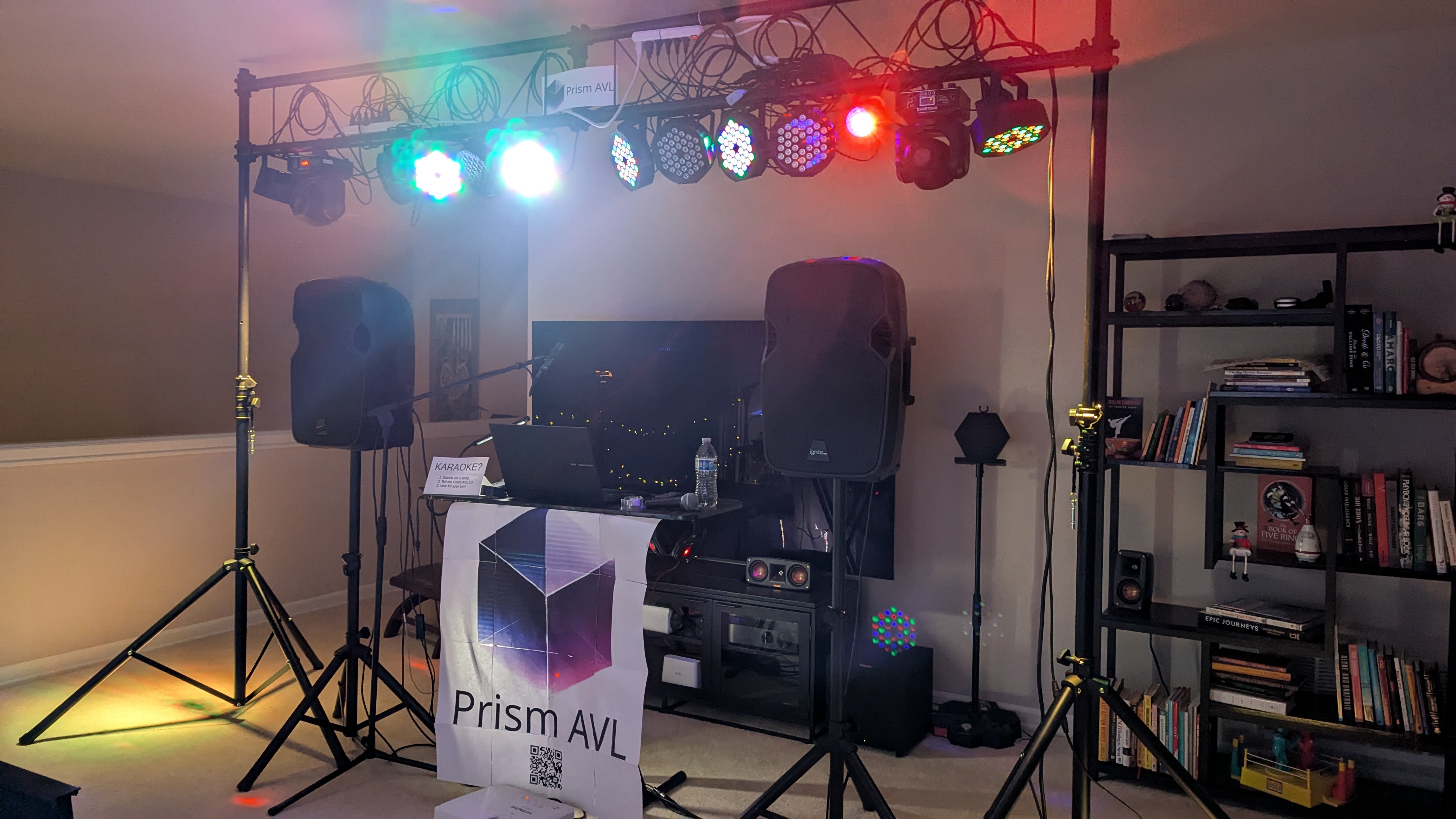 Typical event setup with lighting, speakers, and projector